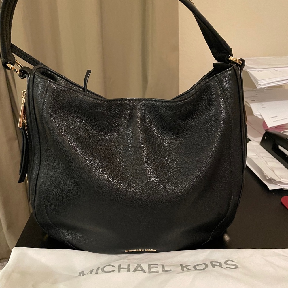 Michael Kors black leather shoulder bag.